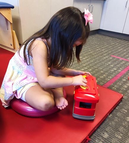 toddler in physical therapy for toe-walking